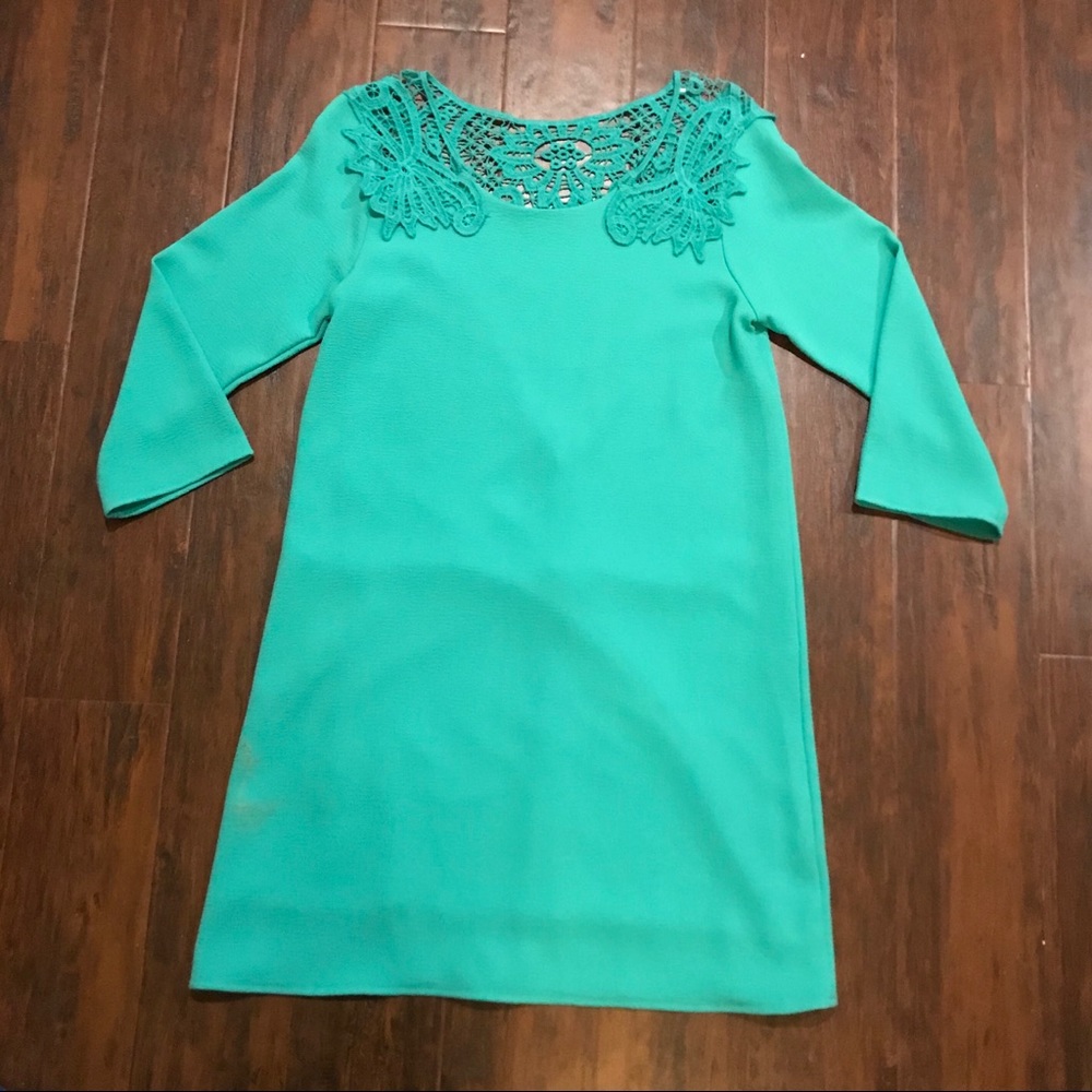 Turquoise lace detailed dresses